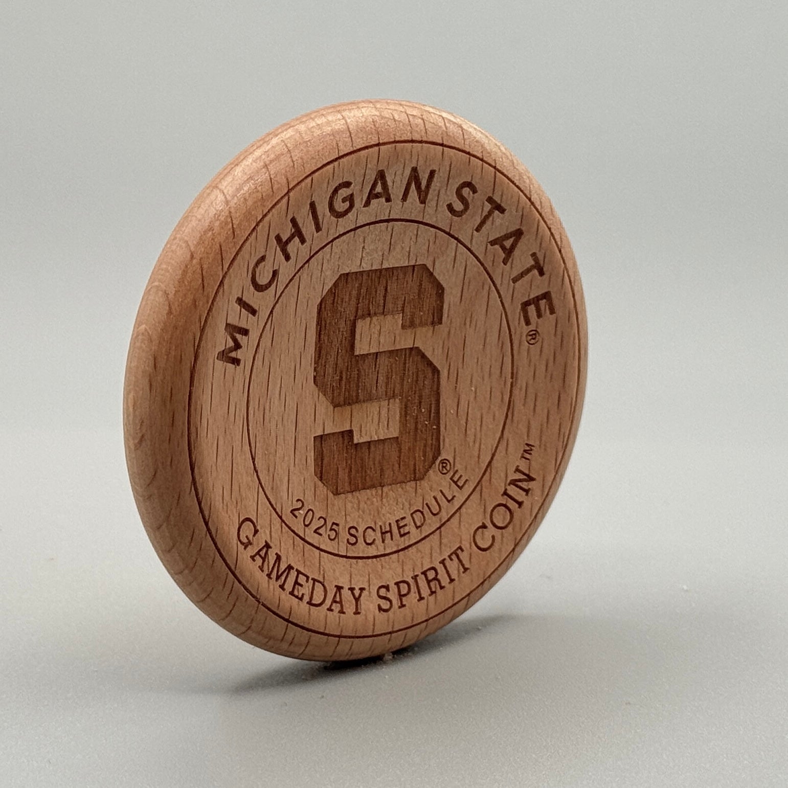 Football Schedule Coin