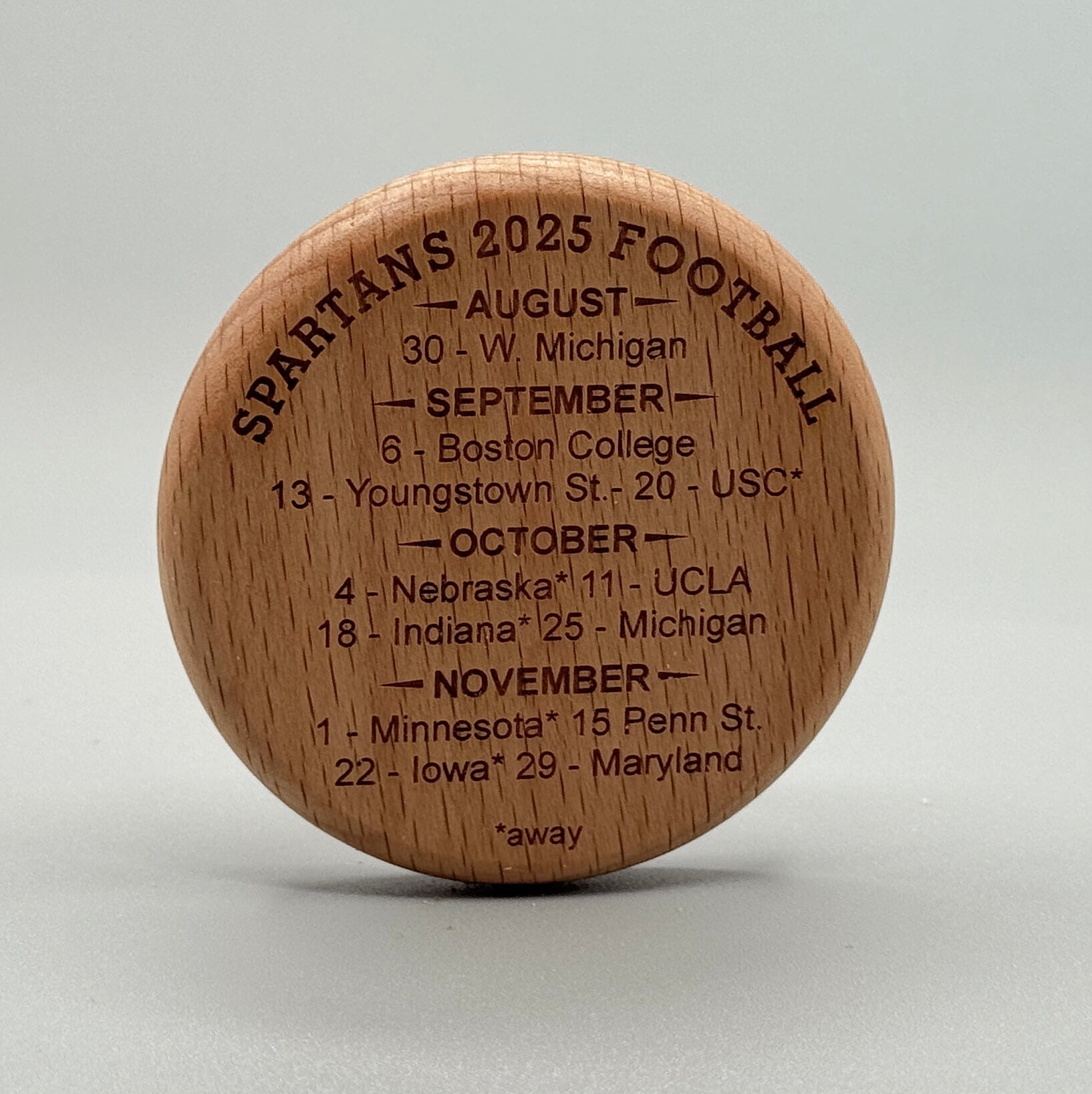Football Schedule Coin